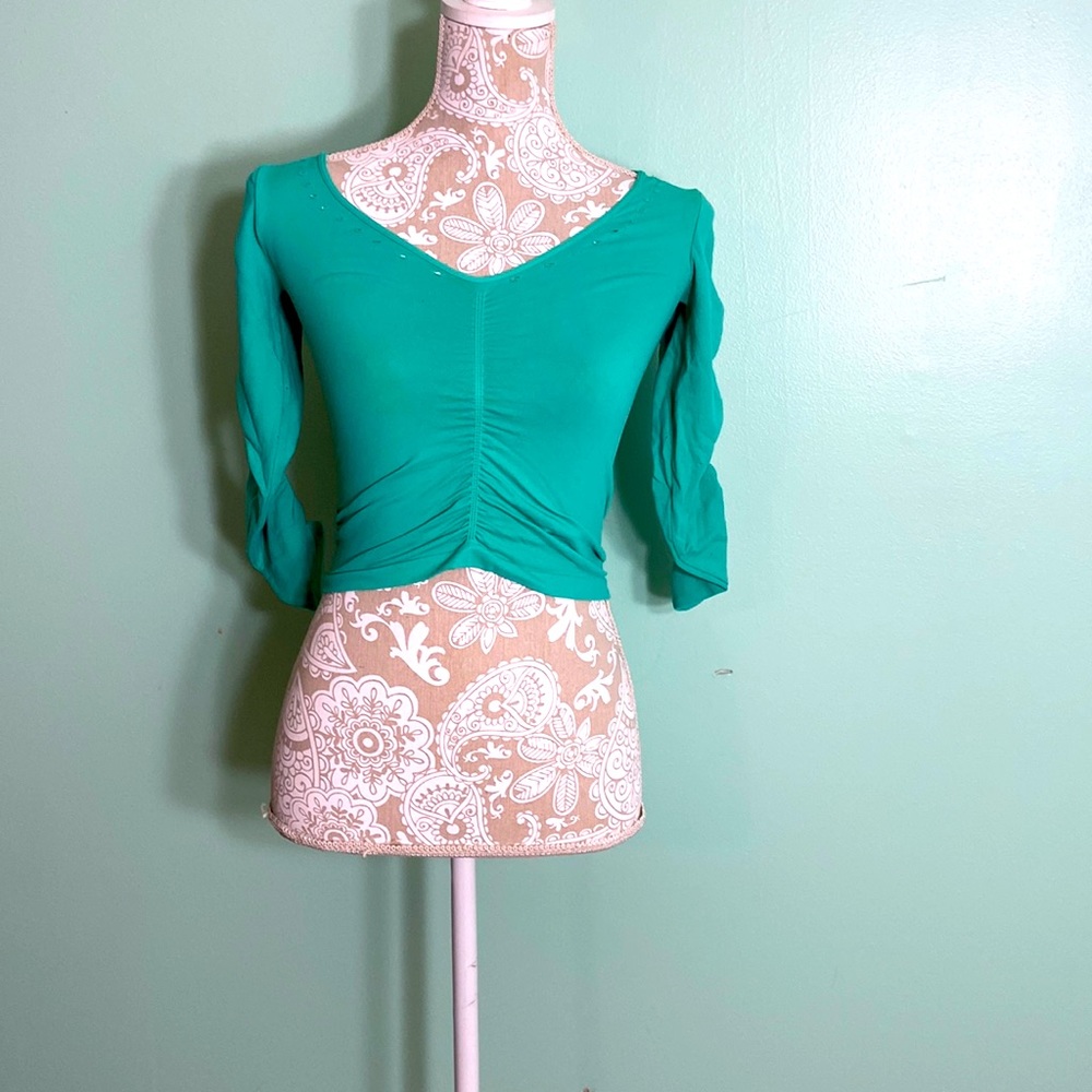 Teal / mint green crop top with cut out detailing from lvl x